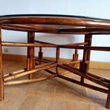 Large telescopic rattan table circa 1970