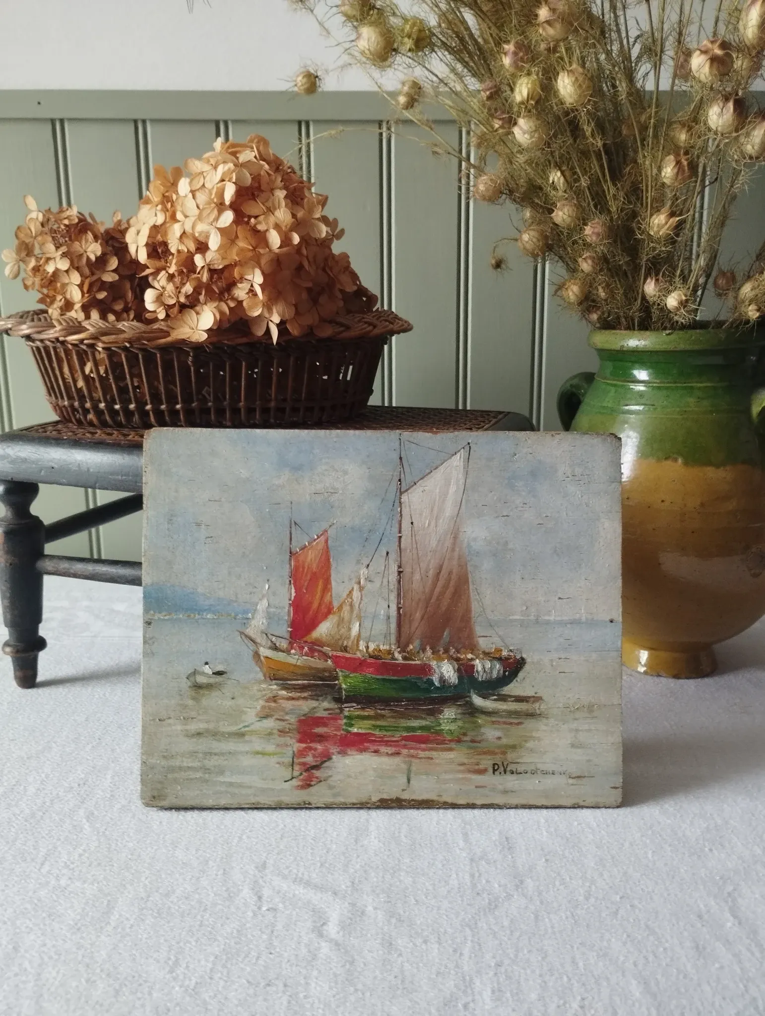 Fishing boats on calm sea. oil painting signed p. volotchenko.