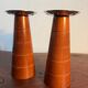 Pair of Guy Degrenne wooden and stainless steel candlesticks