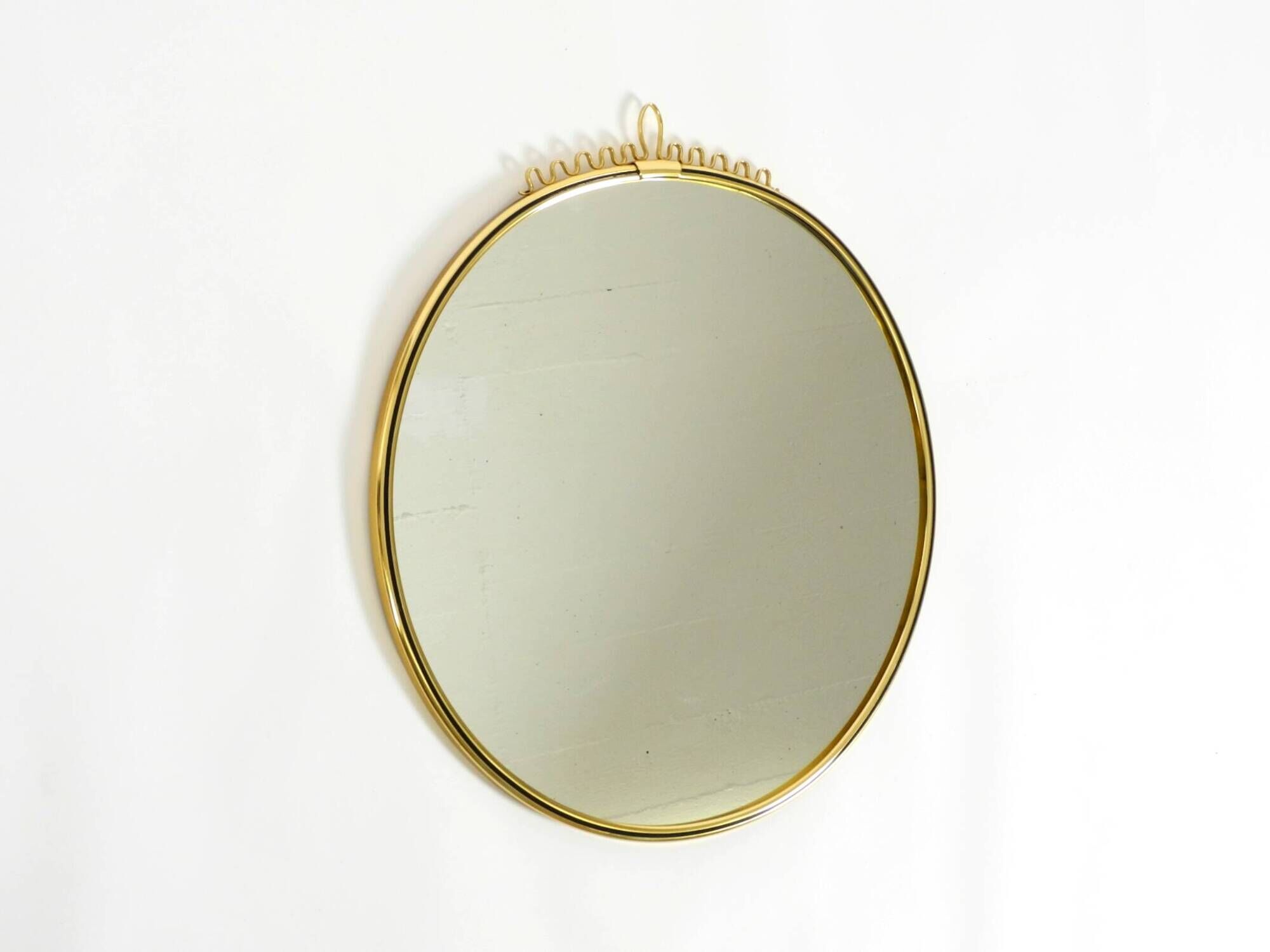 Beautiful, heavy Mid-Century Modern brass wall mirror by Lenz, 1964