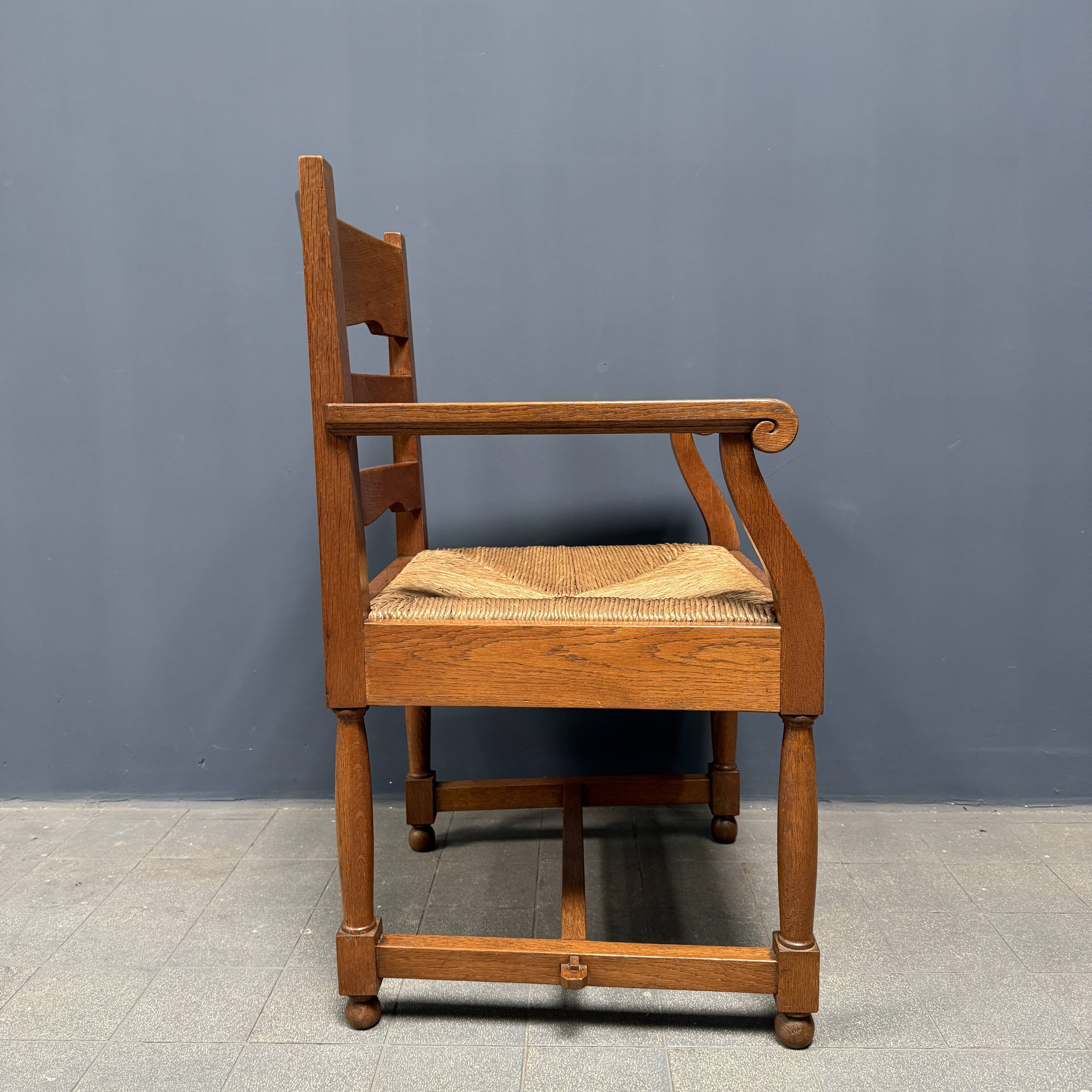 Set of two Dutch oak armchairs with rush seats