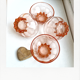 4 Glasses / Cups in translucent pink glass