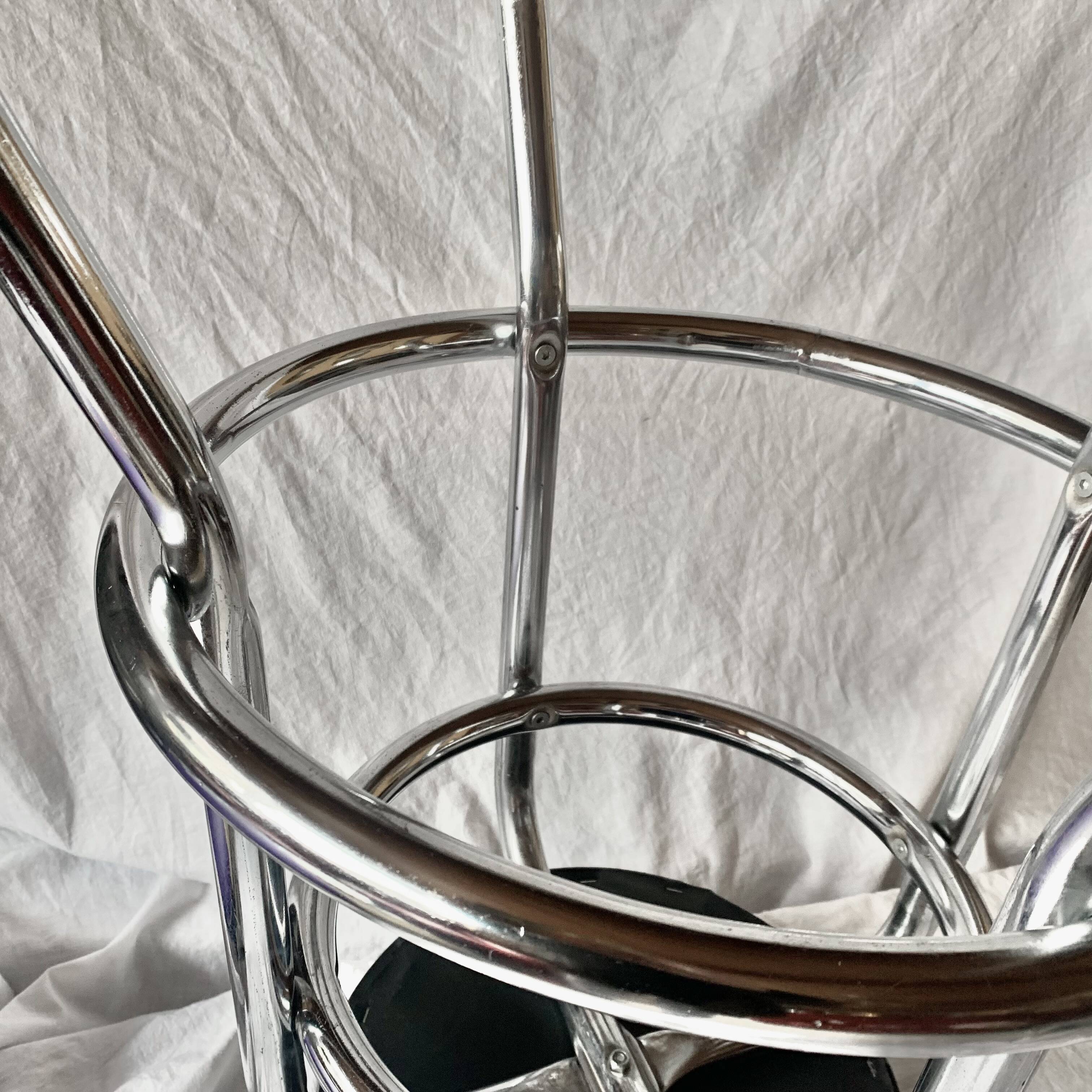 Vintage bar stool in black skai and chrome metal
