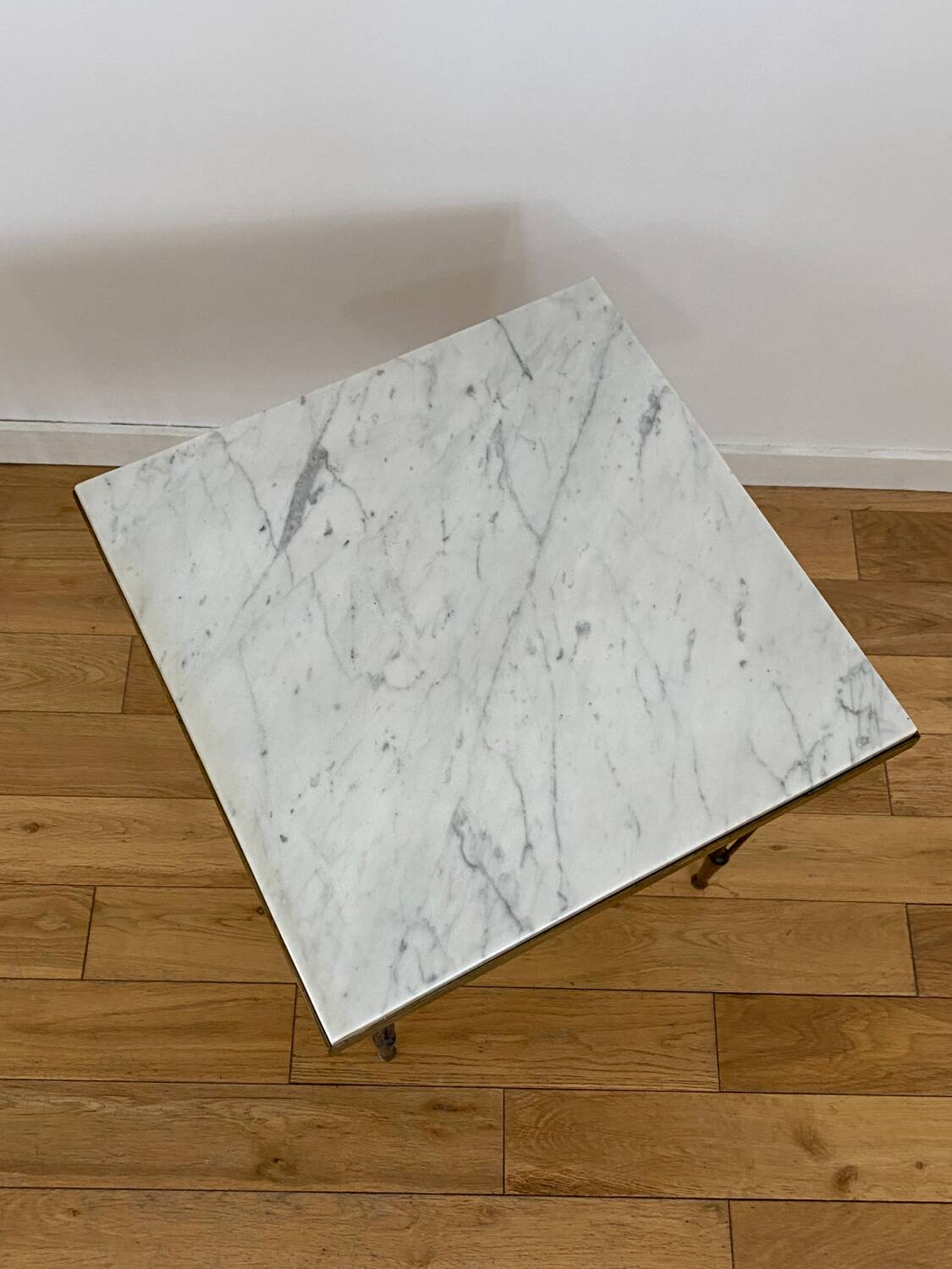 End table in gold metal, white marble top. 60s