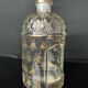 Flacon "Aux Abeilles" Guerlain en verre soufflé et dorure à l'or fin