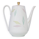 White teapot with pastel flowers