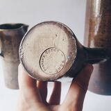 Signed sandstone 'gigognes' carafes