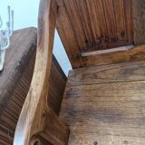 Oak church bench period XVII th century, back decorated with carved parchments