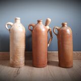 Trio of sandstone carafes with cove