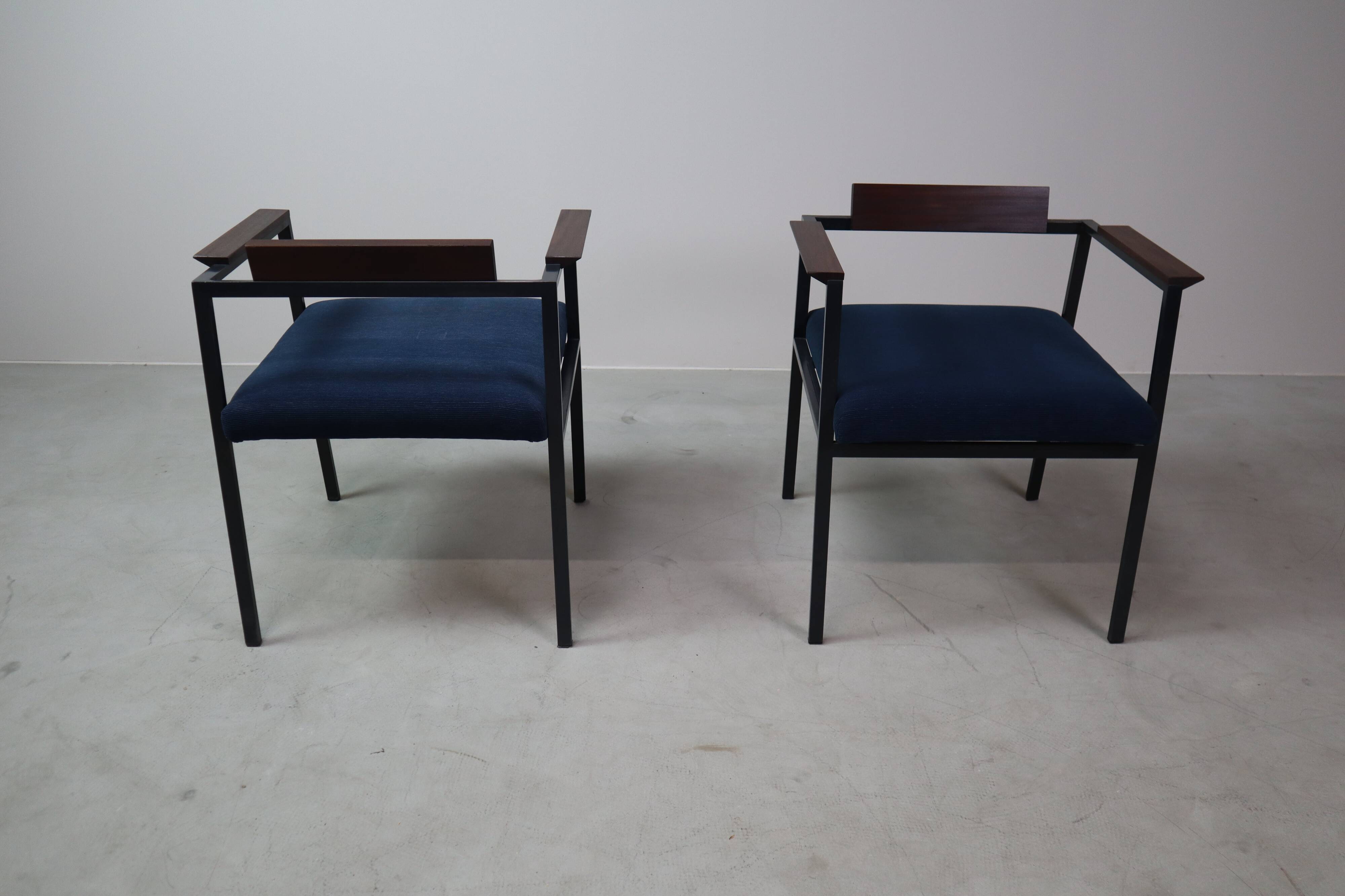 Pair of Postmodern armchairs in steel and mahogany, 1970s