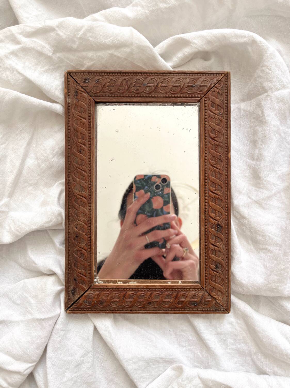 Antique mercury glass barber mirror and carved wooden frame