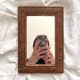 Antique mercury glass barber mirror and carved wooden frame