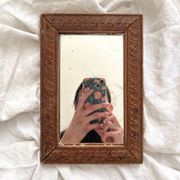 Antique mercury glass barber mirror and carved wooden frame