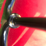 4 black reception chairs with red seats