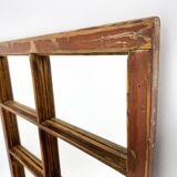Vintage wooden window converted to a mirror