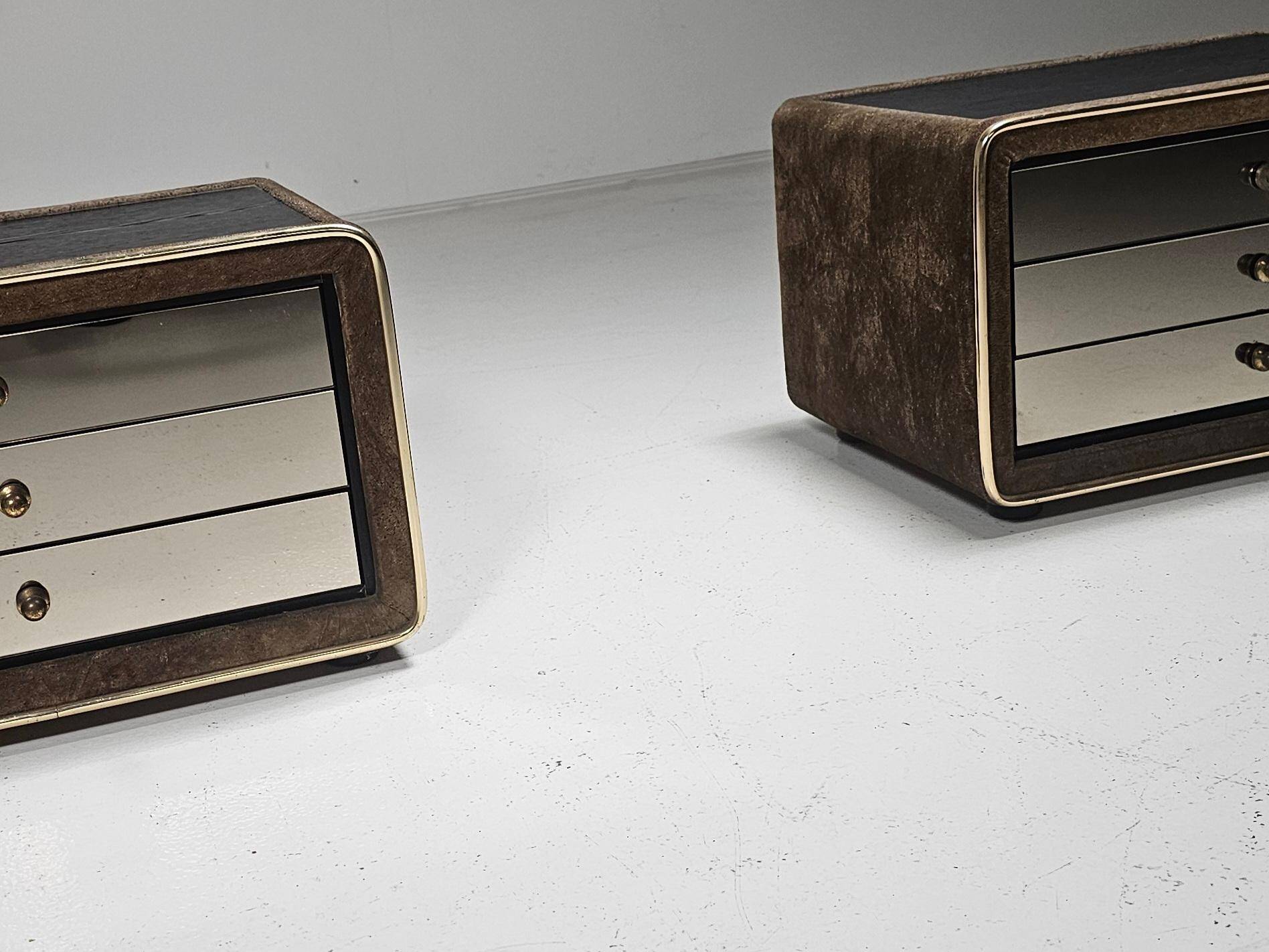 Pair of brass and suede bedside tables by RUF International, 1970.