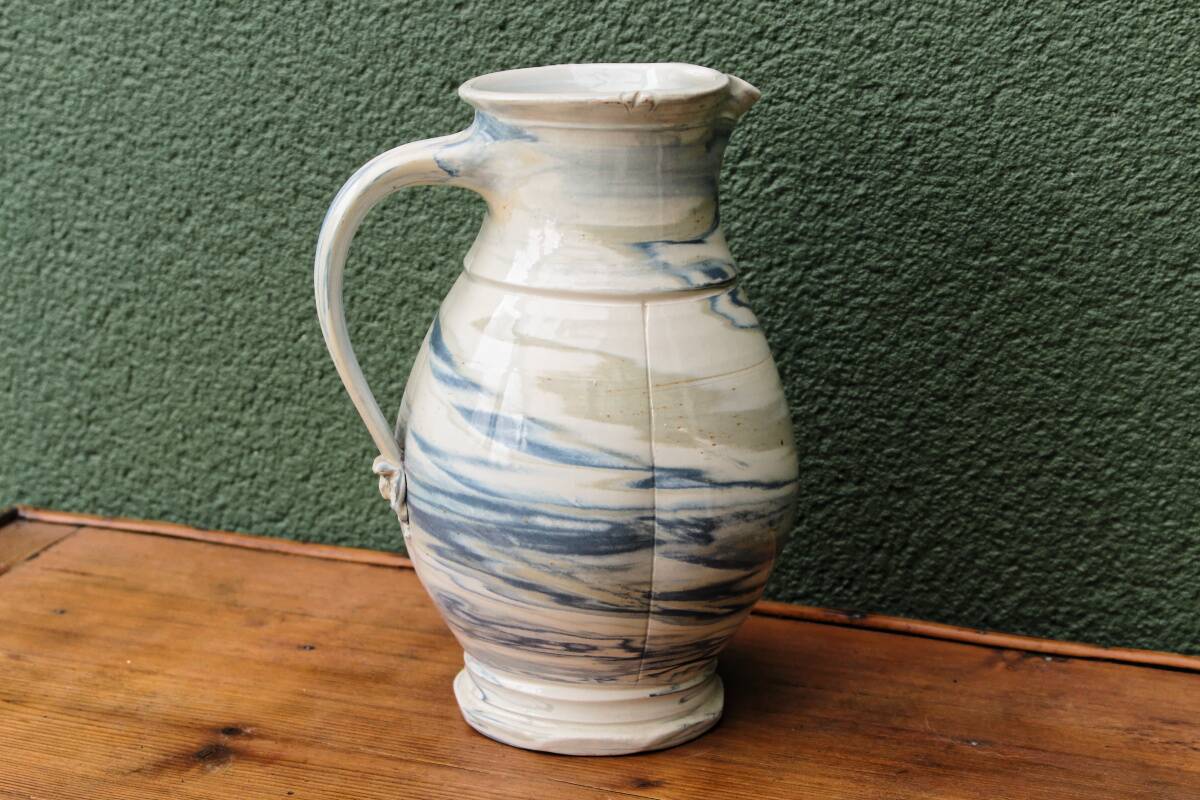 Water jug, signed, blue and white scrolls