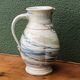 Water jug, signed, blue and white scrolls