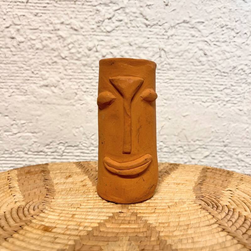 Face terracotta vase