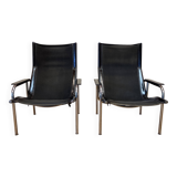 Pair of black leather reclining relaxation armchairs, "Hans Eichenberger" design, 19