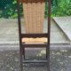 4 Basque solid wood dining chairs with carved straw seats.