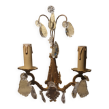 1 crystal prism wall light with 2 lights. Brass frame