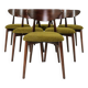 Scandinavian dining chairs set of 10 in sauvage green bouclé.