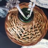 Small bottle style dame Jeanne and its wicker