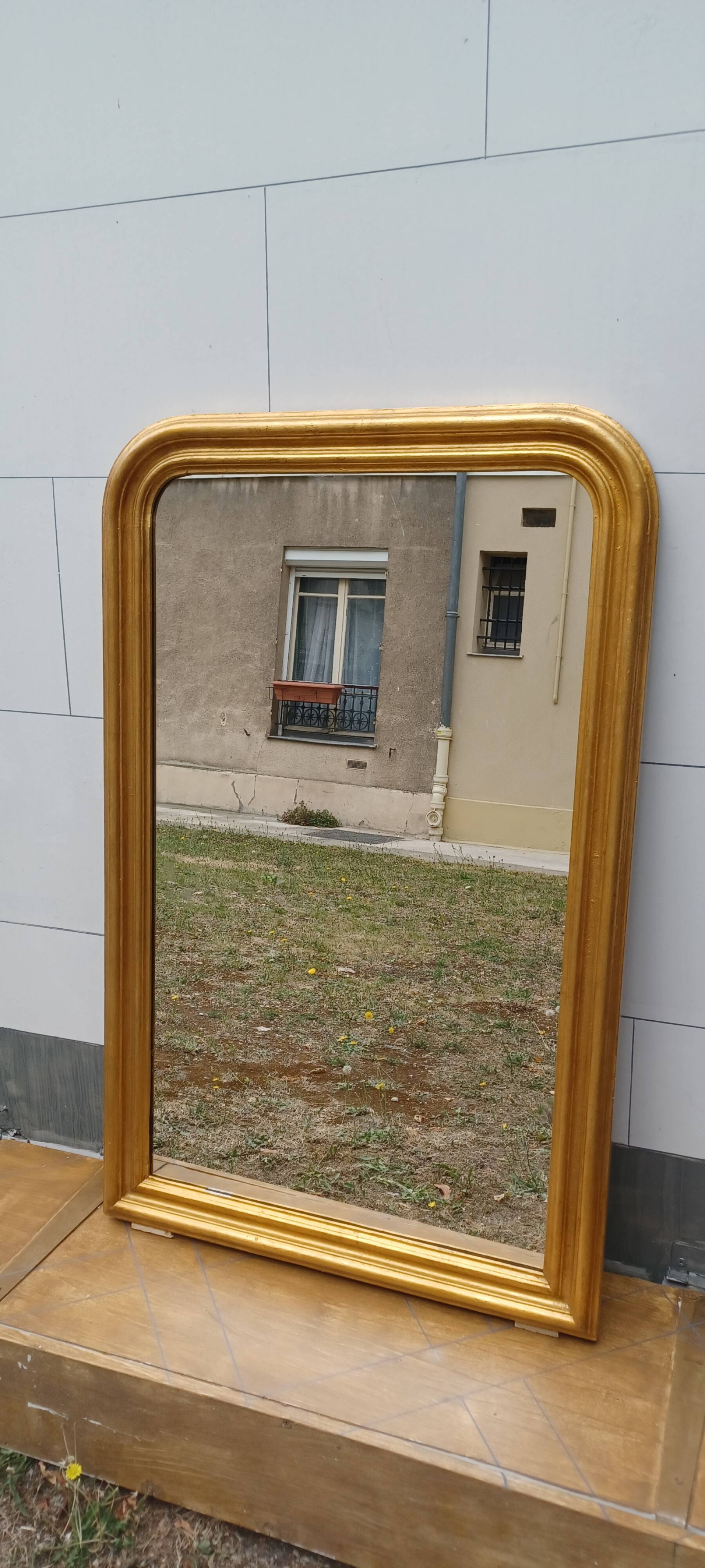 Antique louis-philippe gilt wood mirror from the 19th century. 102 cm x 65 cm