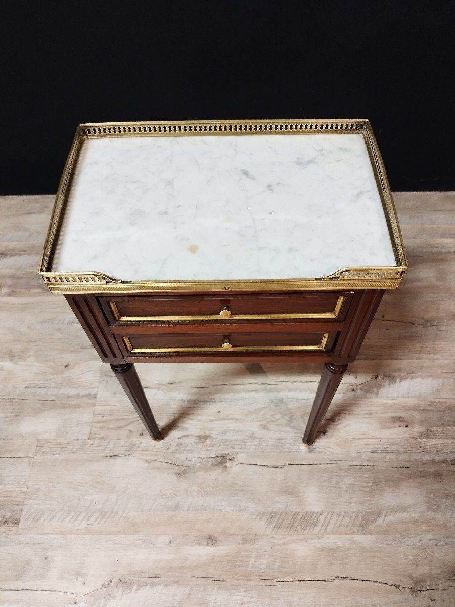 Pair of Louis XVI style bedside tables in mahogany