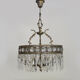 Old chandelier in bronze or silver brass, 4 lights, crystal grapevines. Year 60 70