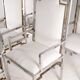 Suite de 6 fauteuils en inox et laiton