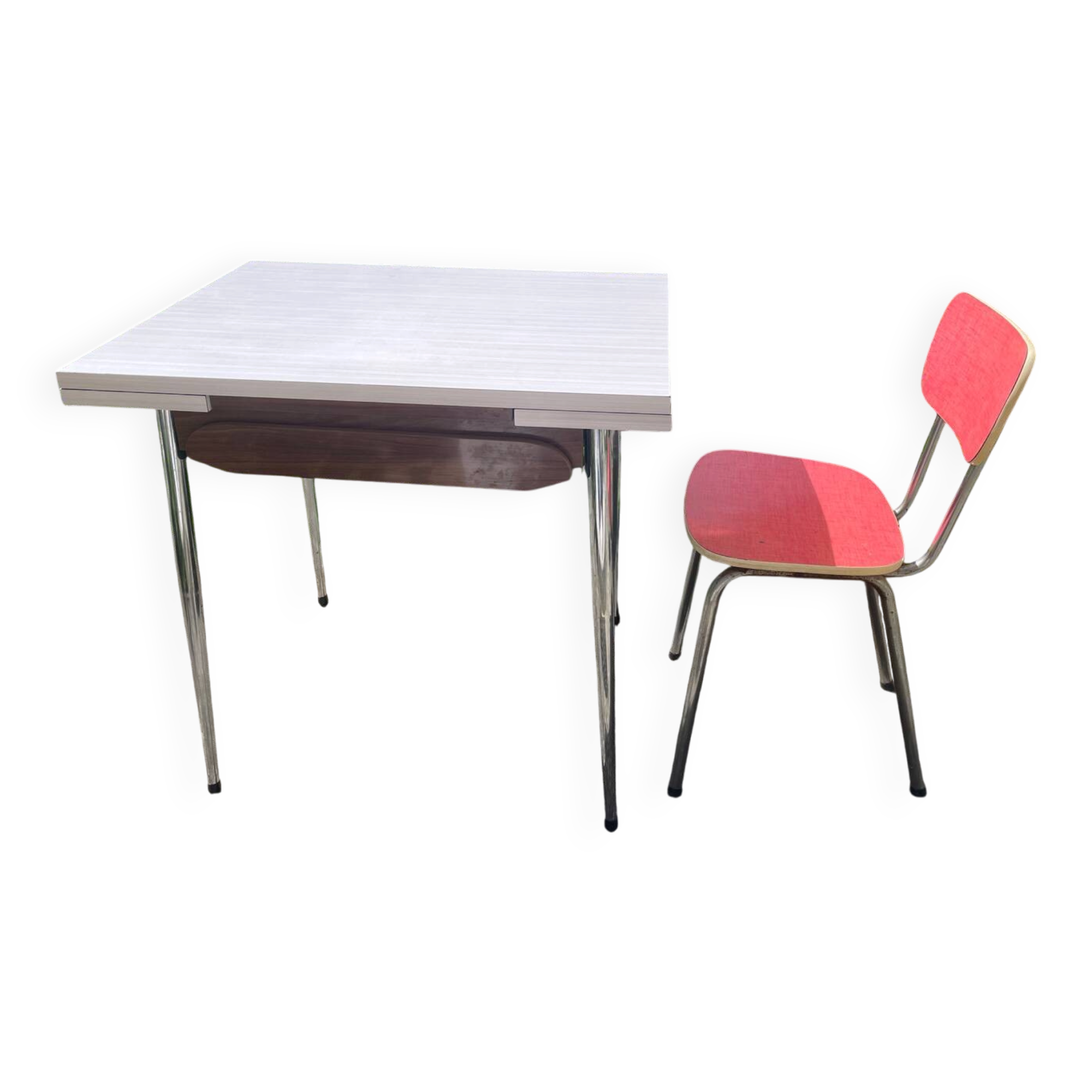 Formica table with a red Mid-century chair.