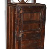 Glass-fronted entrance cabinet in Burmese teak