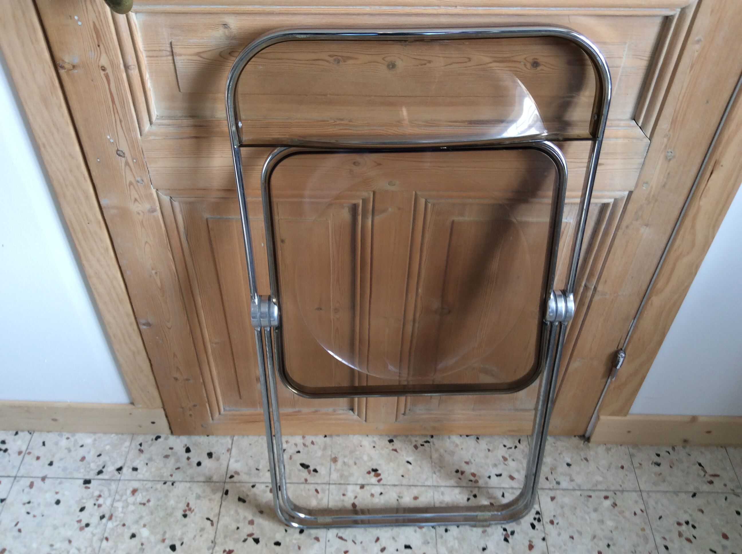 Folded chair by Giancardo Piretti for Castelli