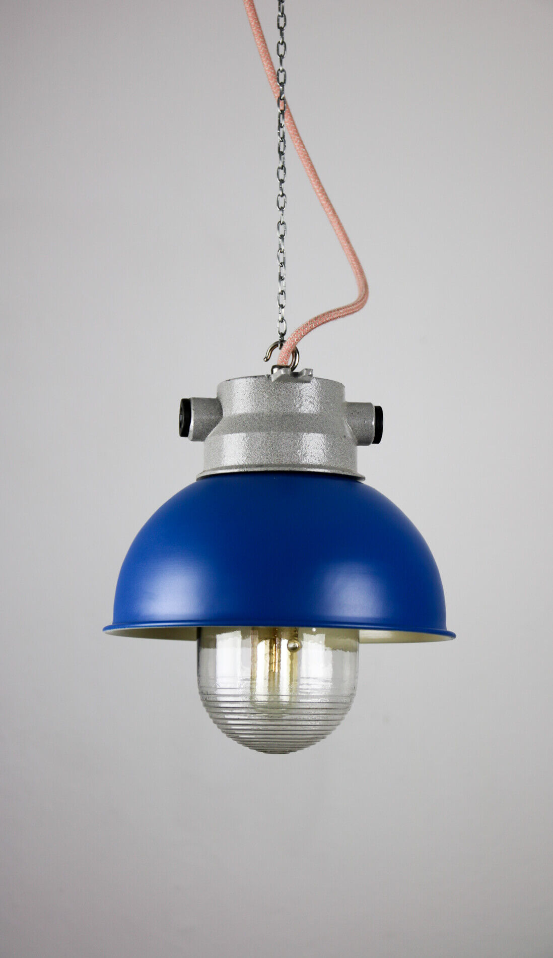 Blue industrial hanging light from tep