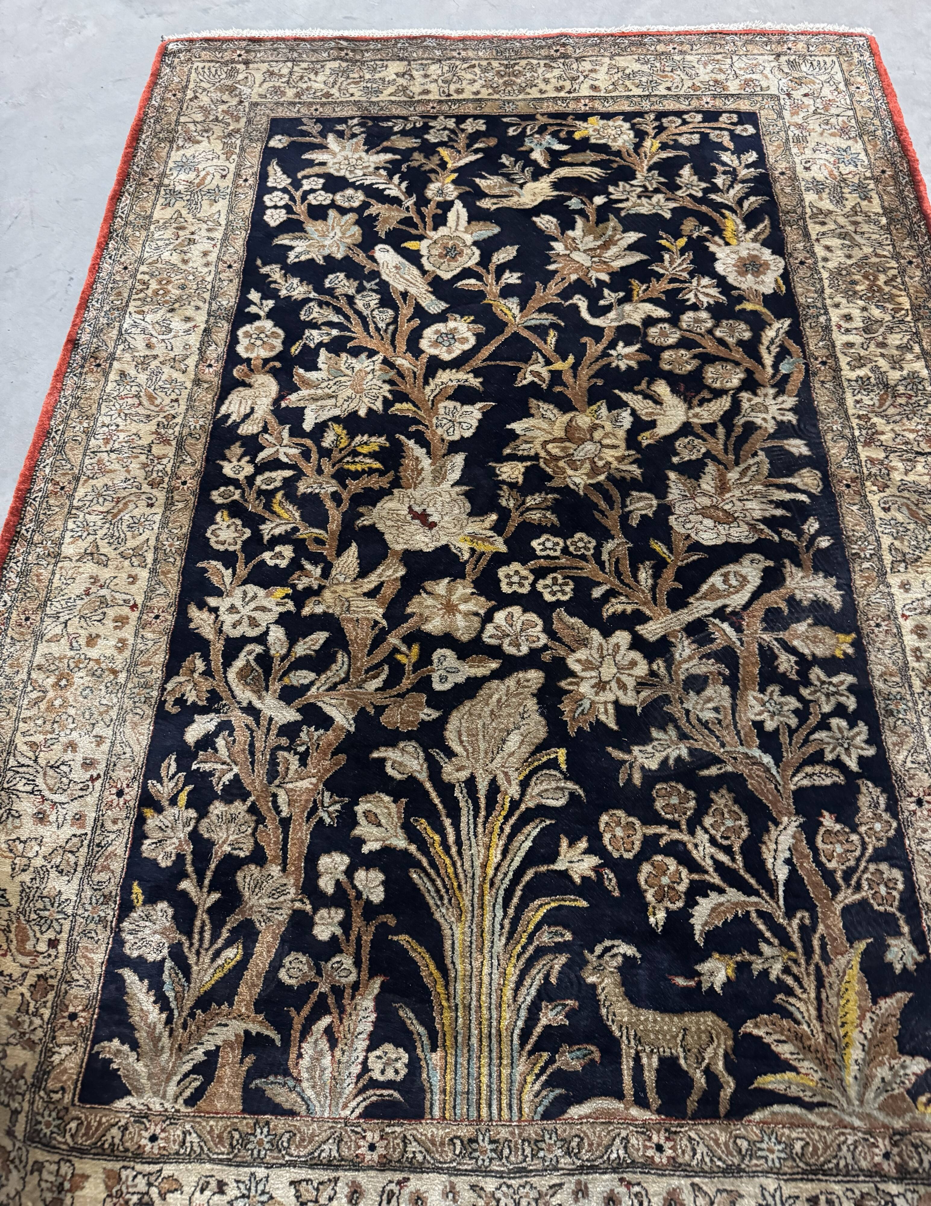 Handmade silk Persian carpet