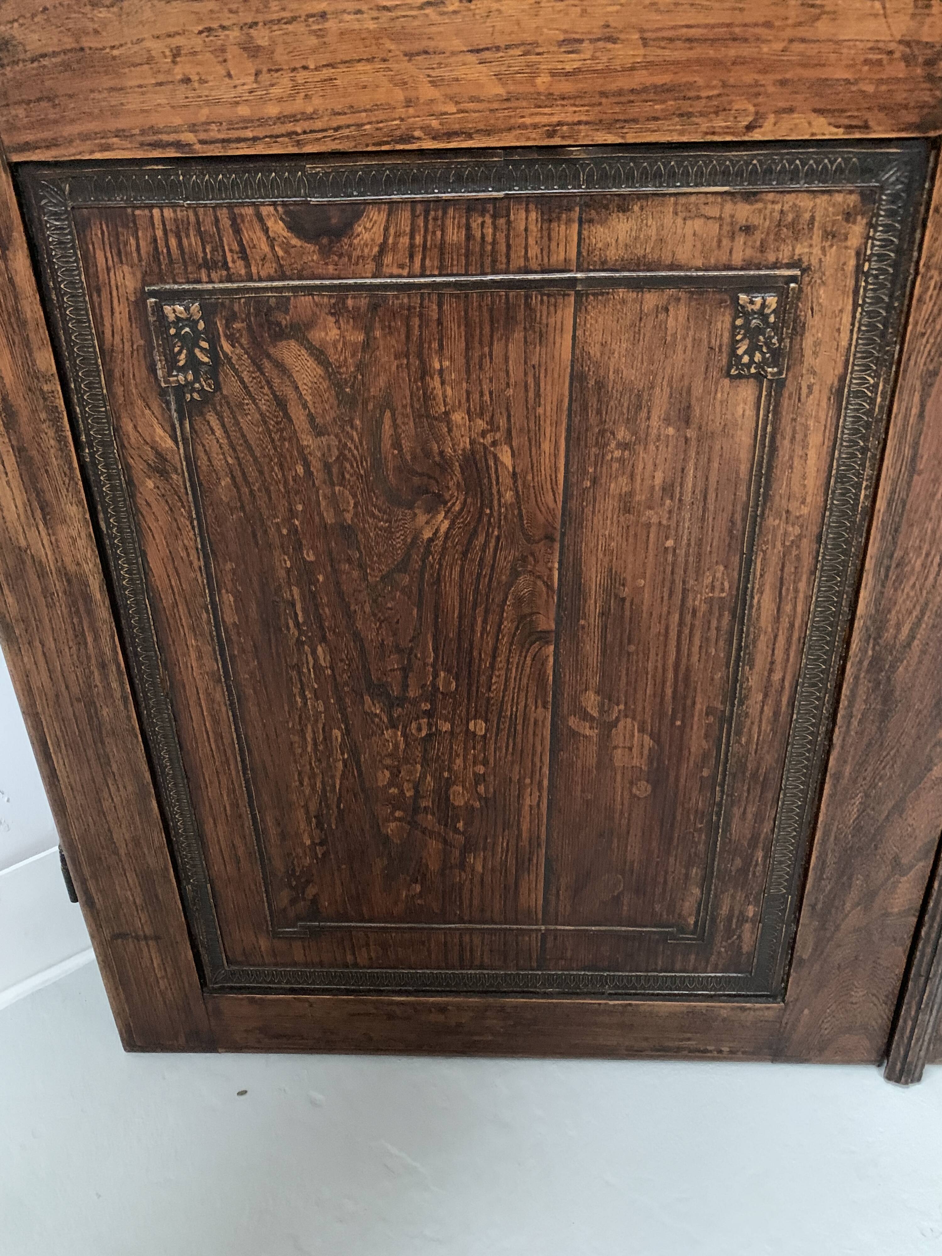 Double cupboard doors in carved oak, 20th century