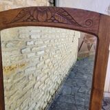 Art Deco oak mirror with bevelled glass from the 1930s.