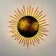 French gilt metal sunburst light fixture, Gilbert Poillerat, 1930s France