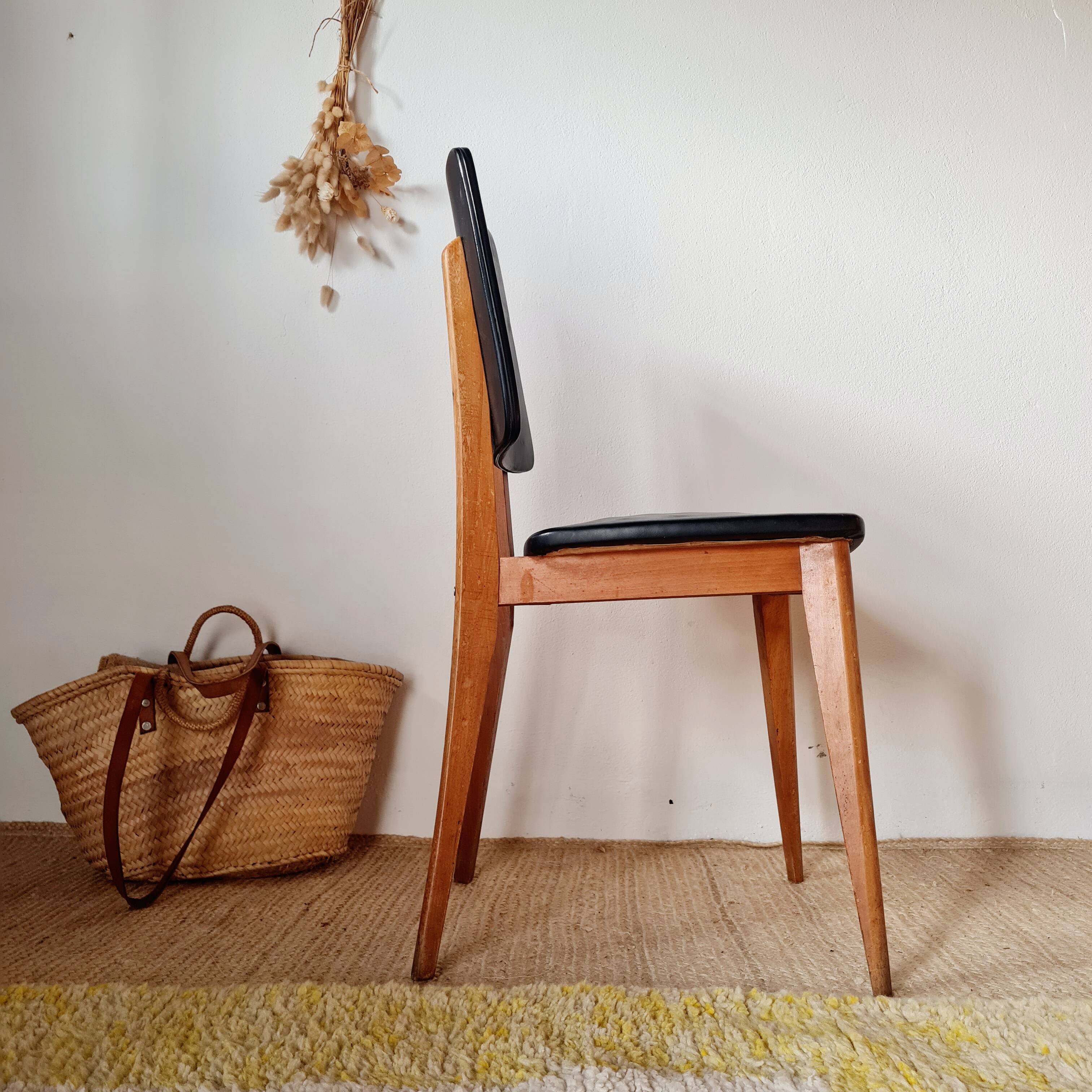 Vintage Scandinavian chair with compass legs.