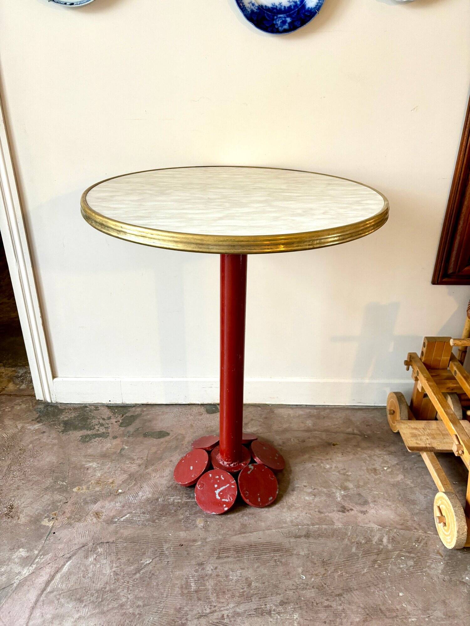 Bistro table in burgundy metal and beige melamine