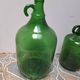 Set of 2 vintage green glass Demijohns.