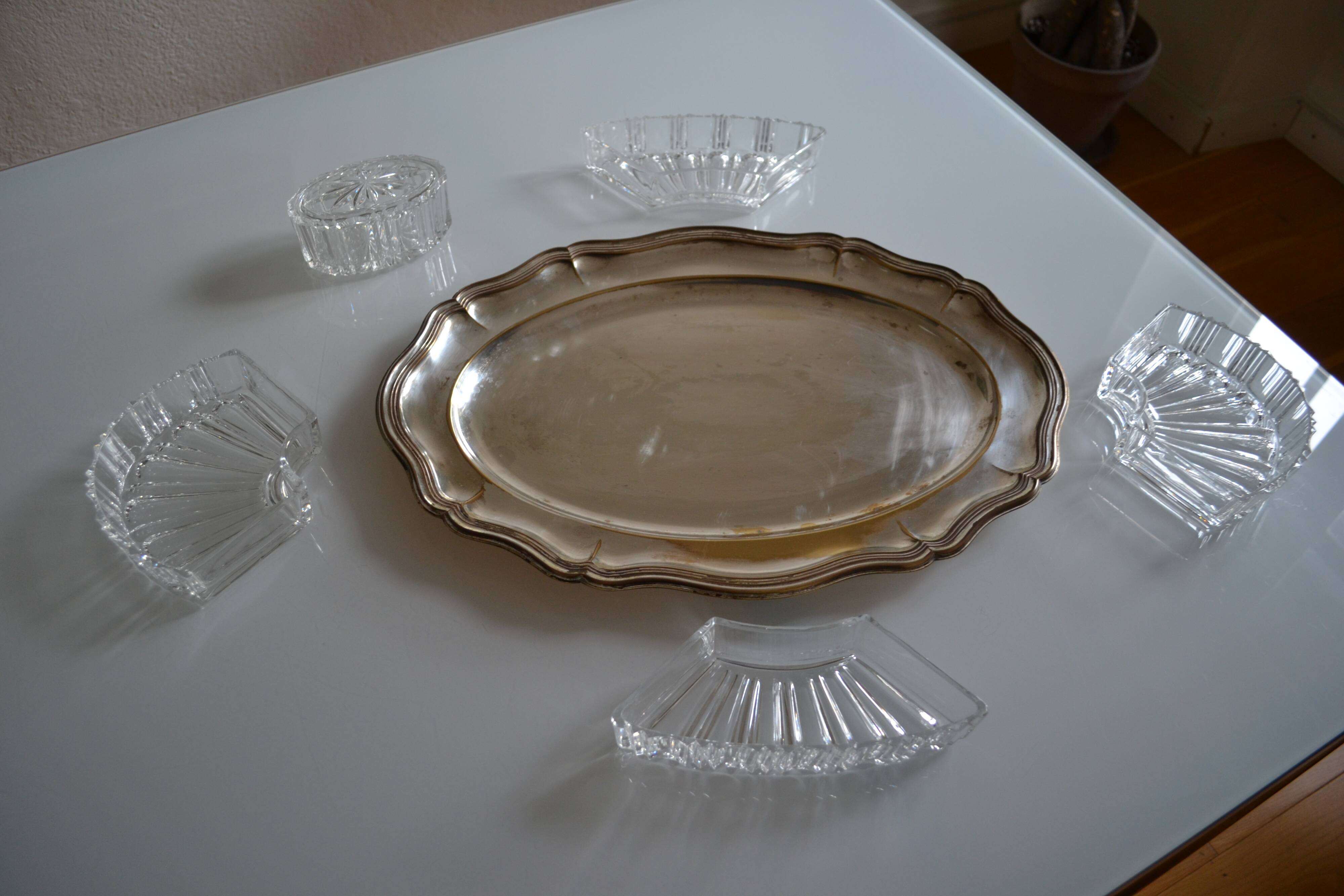 Silver-plated metal aperitif serving tray with HKE hallmark and glass.
