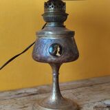 Repoussé brass lamp with floral motifs, decorated with 3 miniature medallions