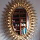 Miroir soleil doré vintage