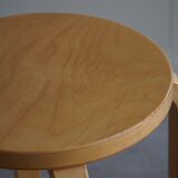 Alvar Aalto, a pair of vintage birch stools, model "60", made by Artek, 1970s.