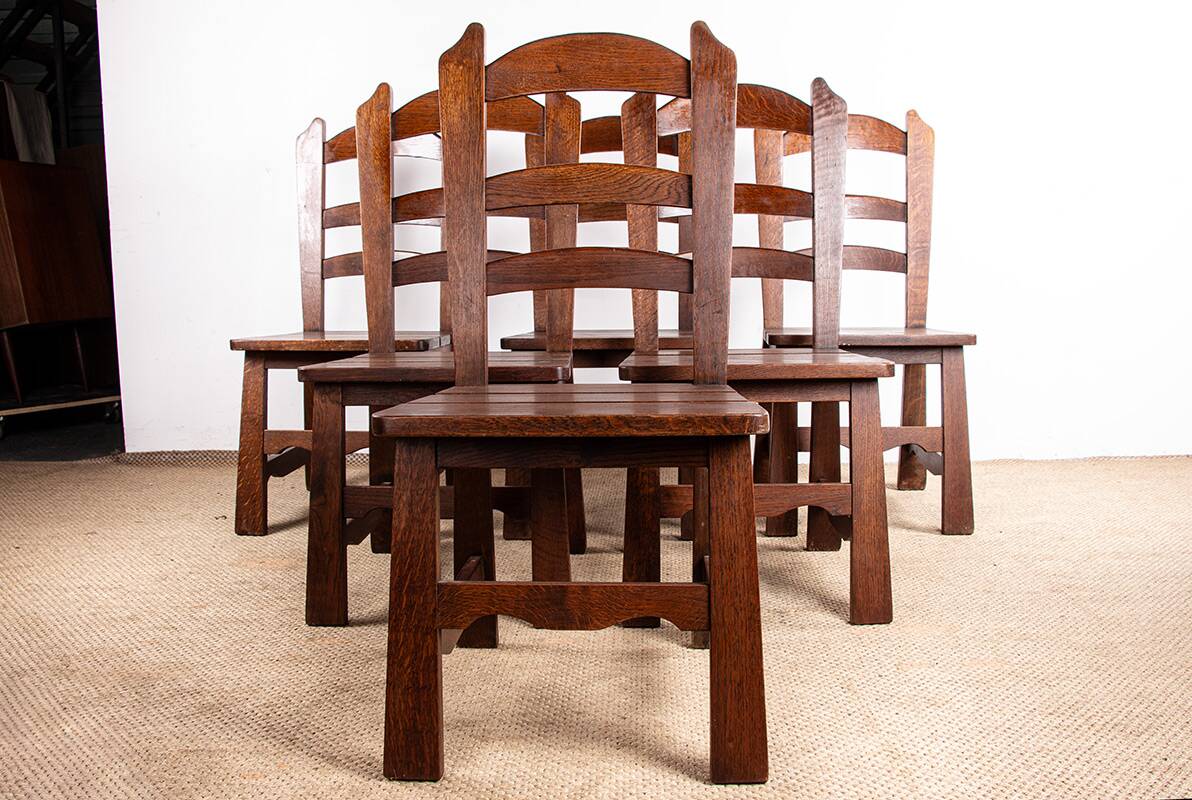 Set of 6 large Brutalist chairs in solid oak from the 1950s.