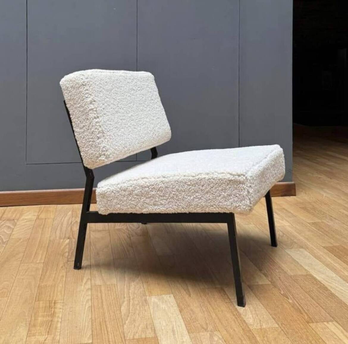 Vintage armchair, black metal and sheepskin fabric, France 1950