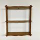 Vintage turned wood wall shelf with 3 levels.